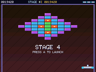 Brick Storm gameplay: a diamond of coloured bricks above a paddle